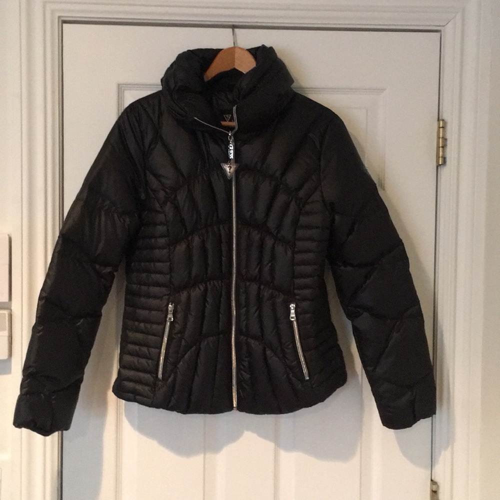 Guess down jacket never worn.